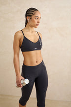Black thin strap sports bra front view women's activewear yoga pilates